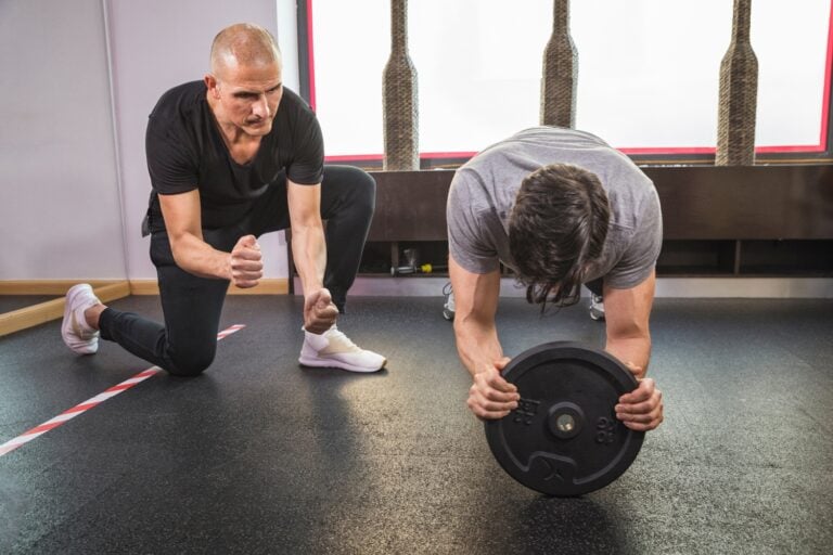 Qualified personal trainer working with a client at Active Fitness Medowie