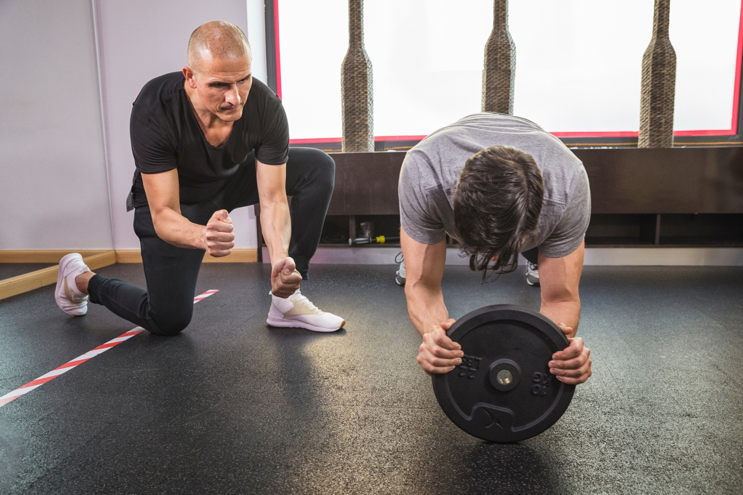 Qualified personal trainer working with a client at Active Fitness Medowie