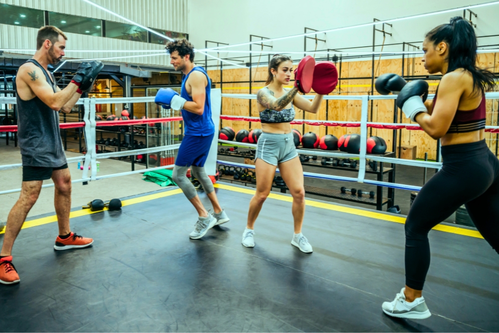 Boxing class at Active Fitness Medowie with participants hitting focus mitts.